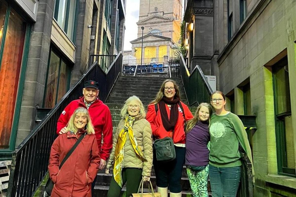 a group of people posing for a picture on a staircase