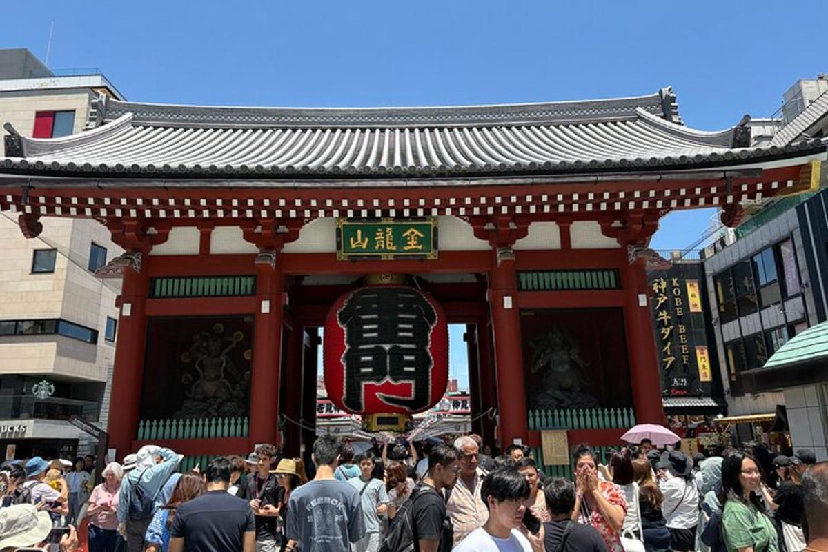 a crowd of people standing in front of a temple