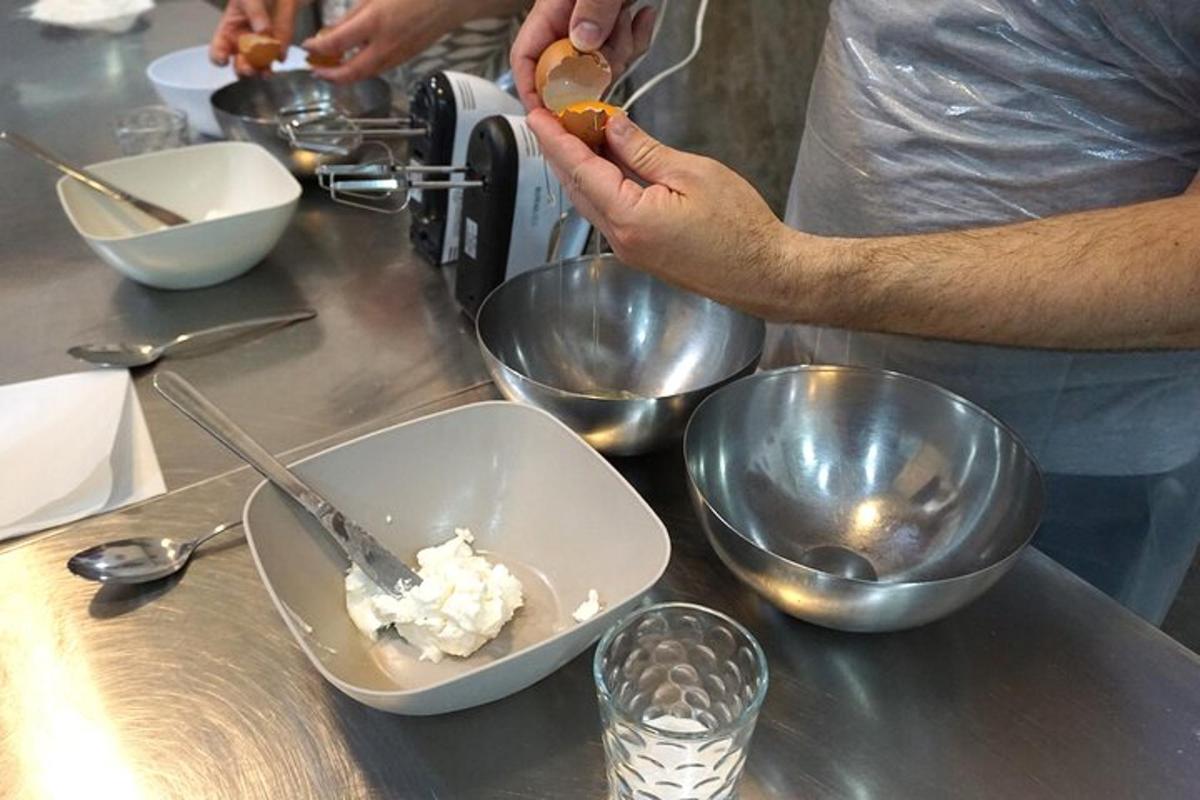 a man is mixing food in a bowl on a counter