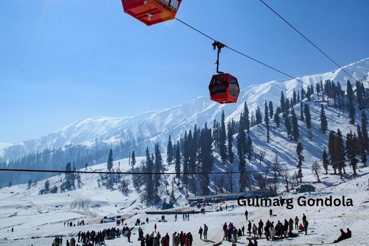 a group of people on a ski slope with a ski lift