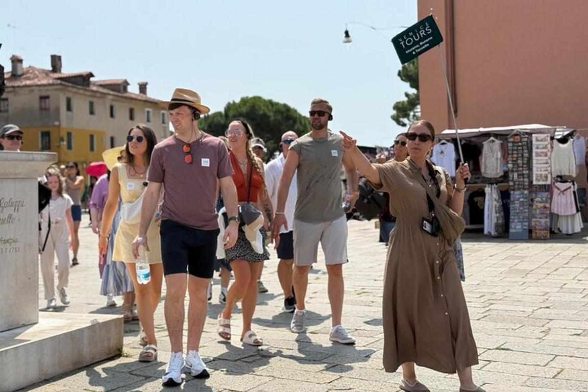 a group of people walking down a street