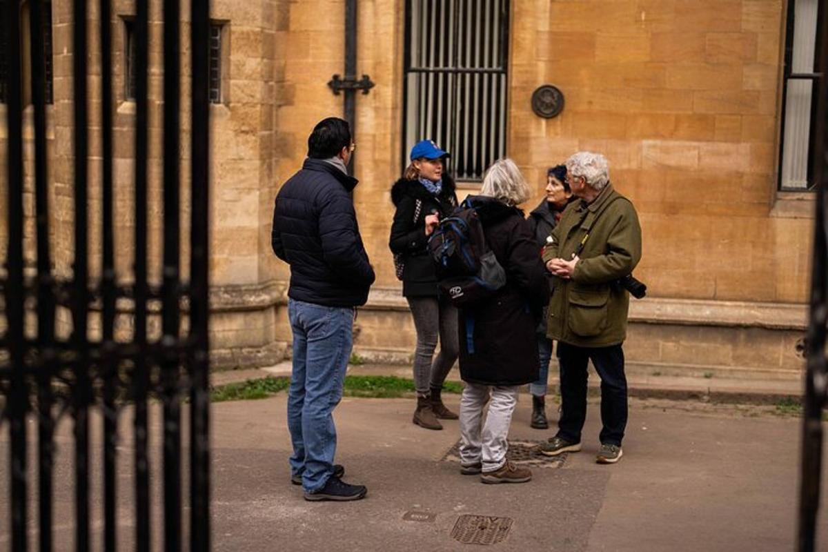 a group of people standing in front of a building