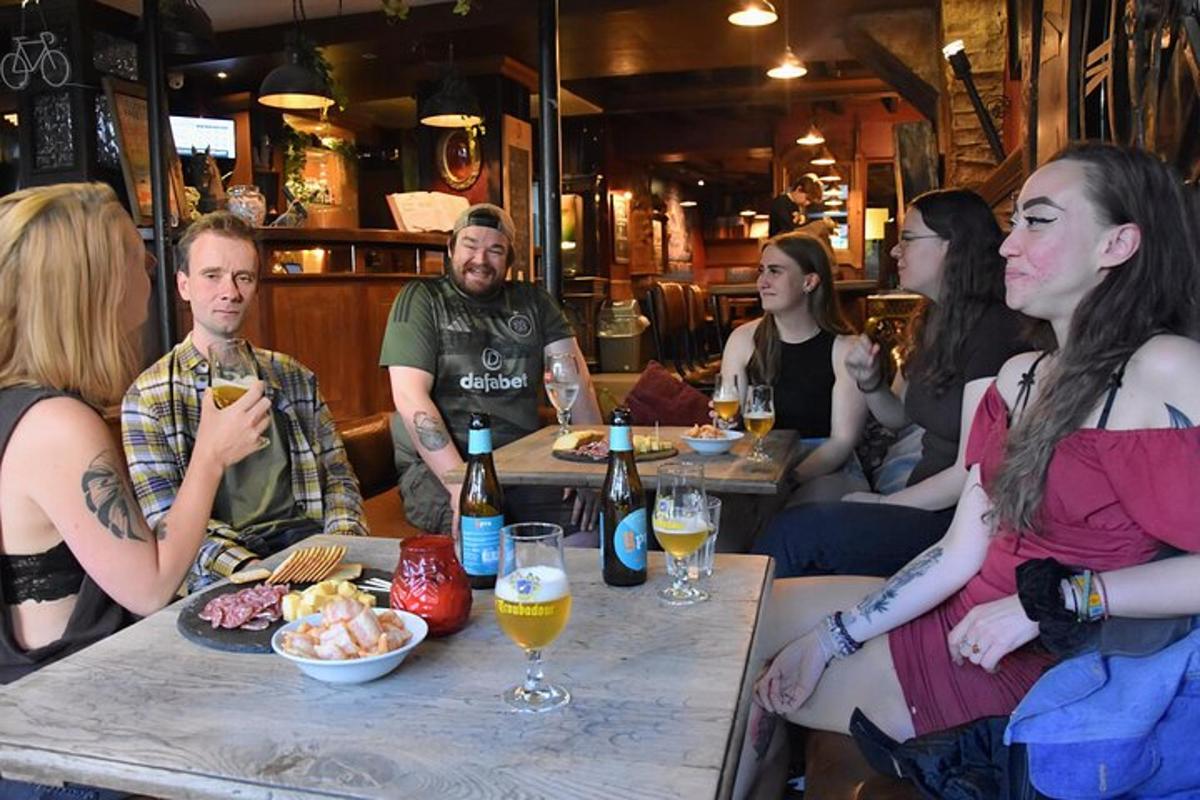 a group of people sitting at a table in a restaurant