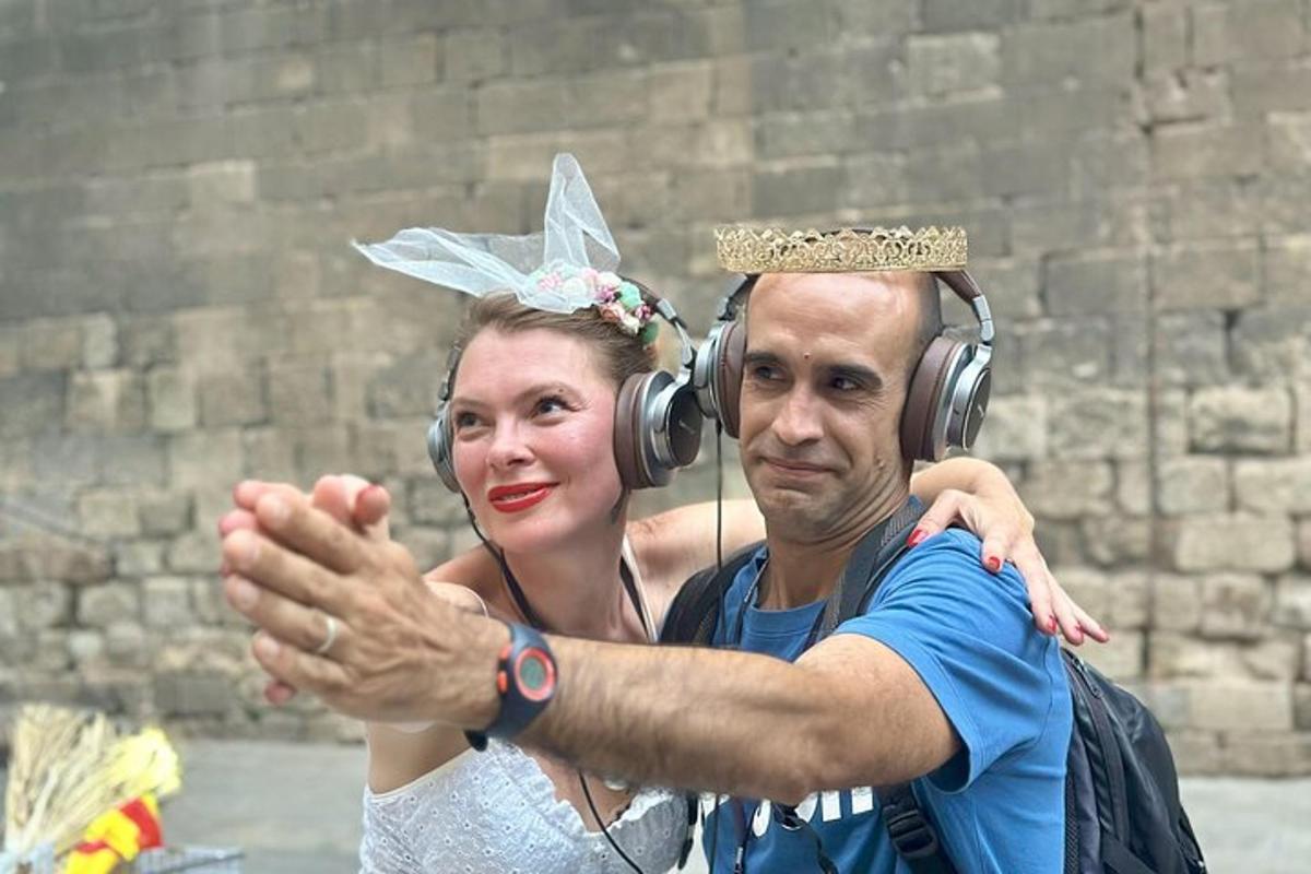 a man and a woman with headphones on their head
