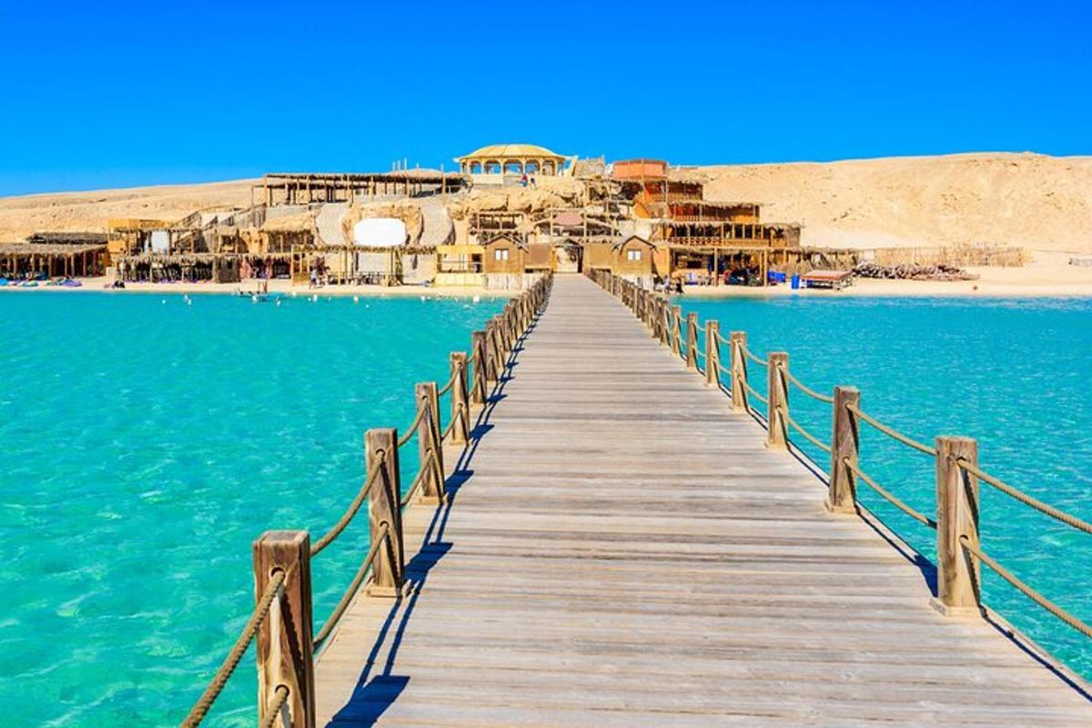 a wooden pier in the middle of the water