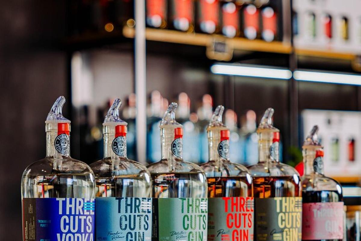 a group of bottles of whiskey on a shelf