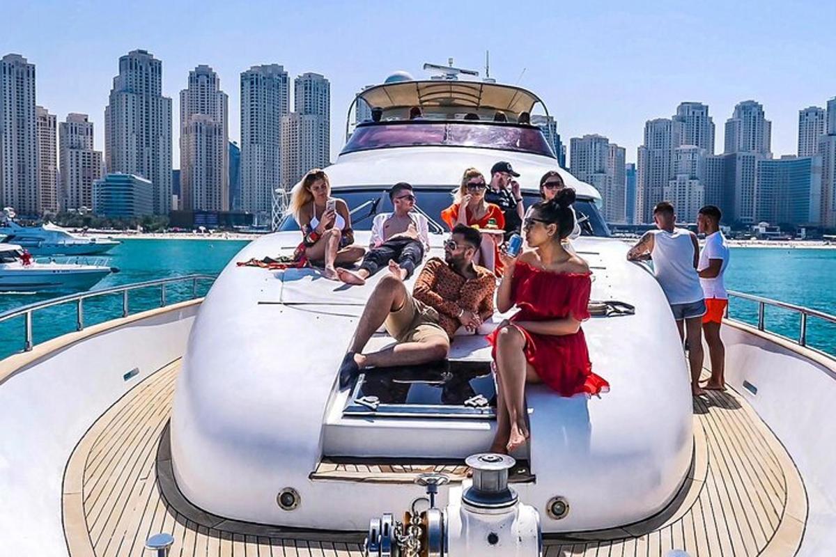 a group of people sitting on the back of a boat