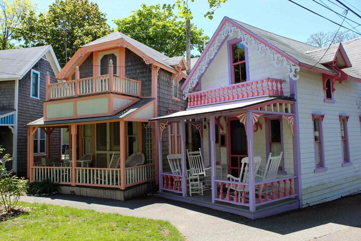a house with a deck and chairs on the porch