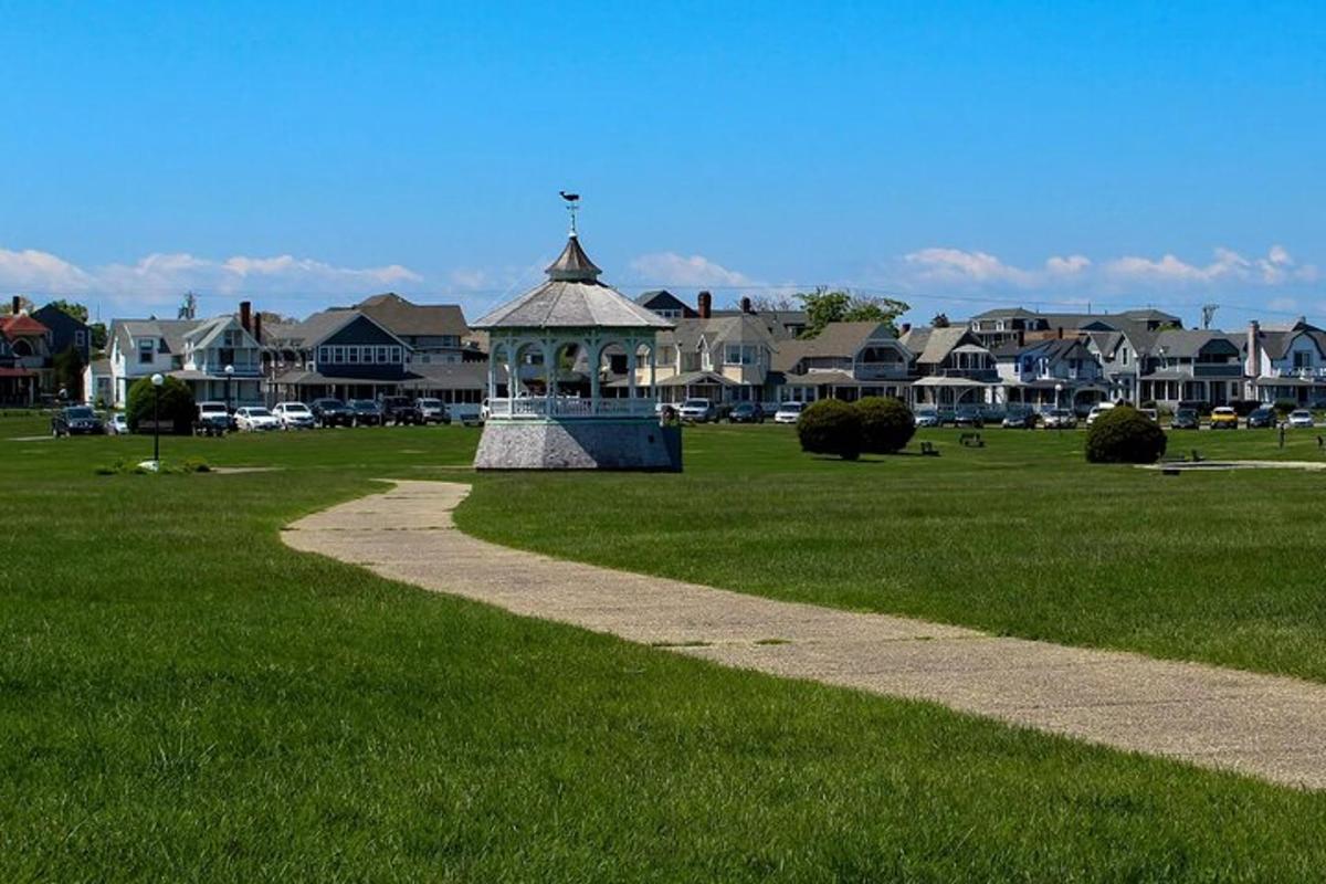 a park with a gazebo in the grass