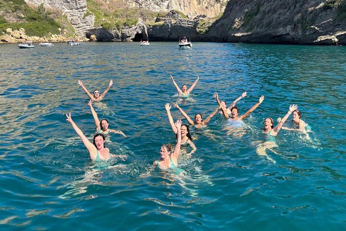 a group of people swimming in the water