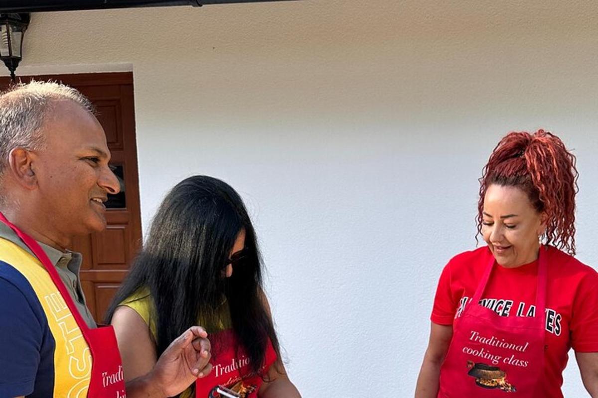 a man and two women standing next to each other