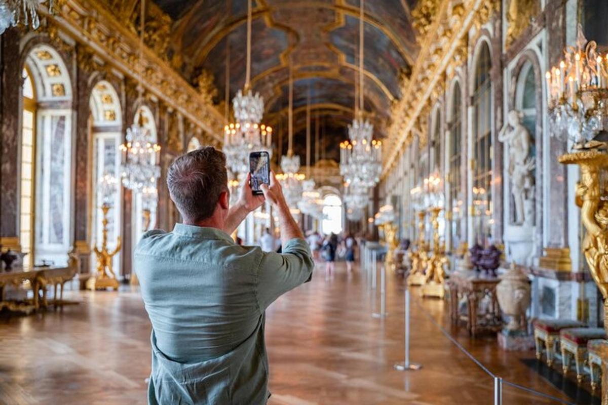 a man taking a picture of a room in a building
