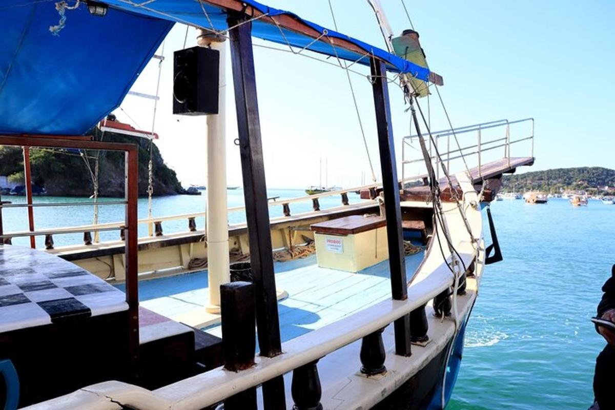a boat is docked at a dock in the water