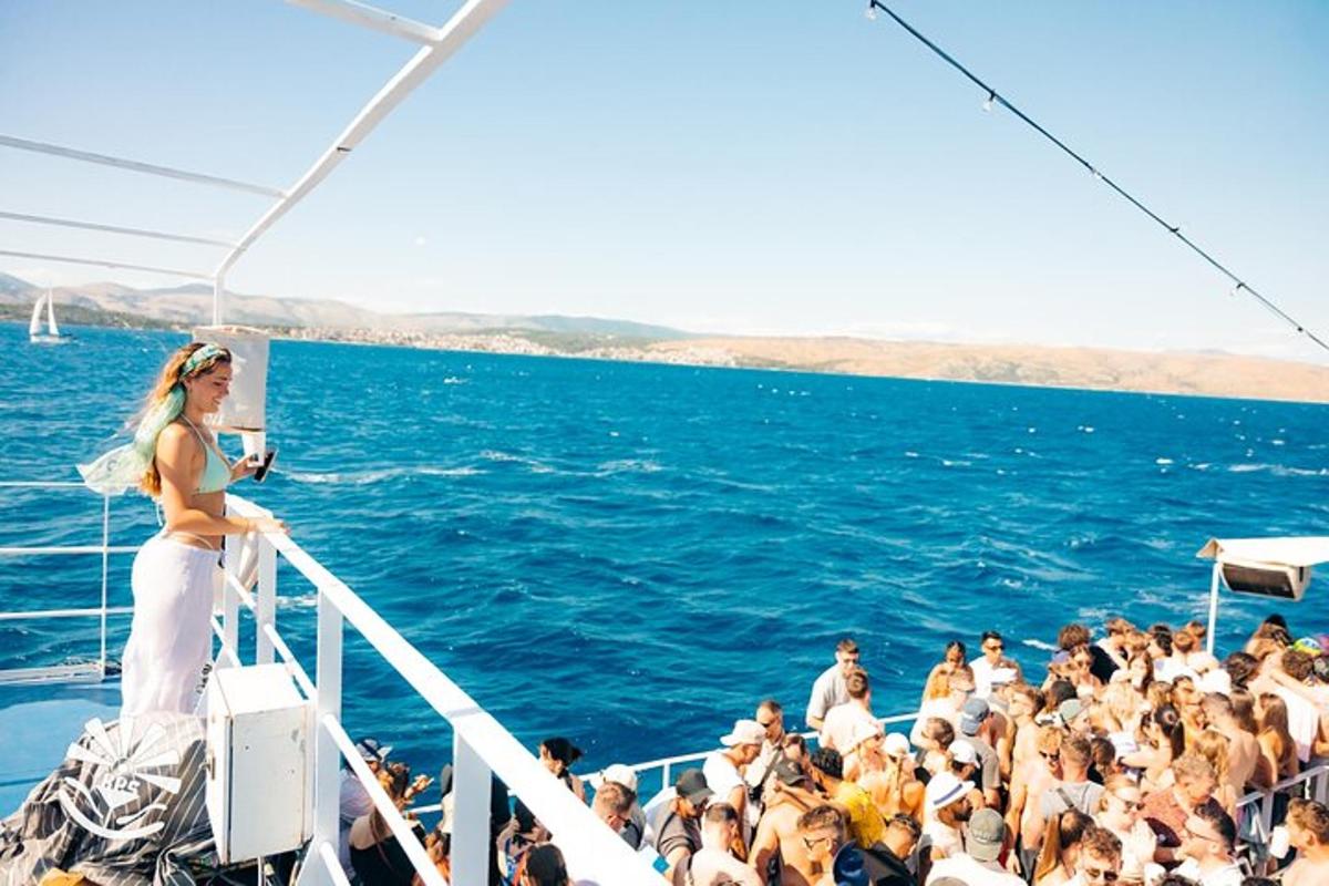 a group of people on a boat in the water