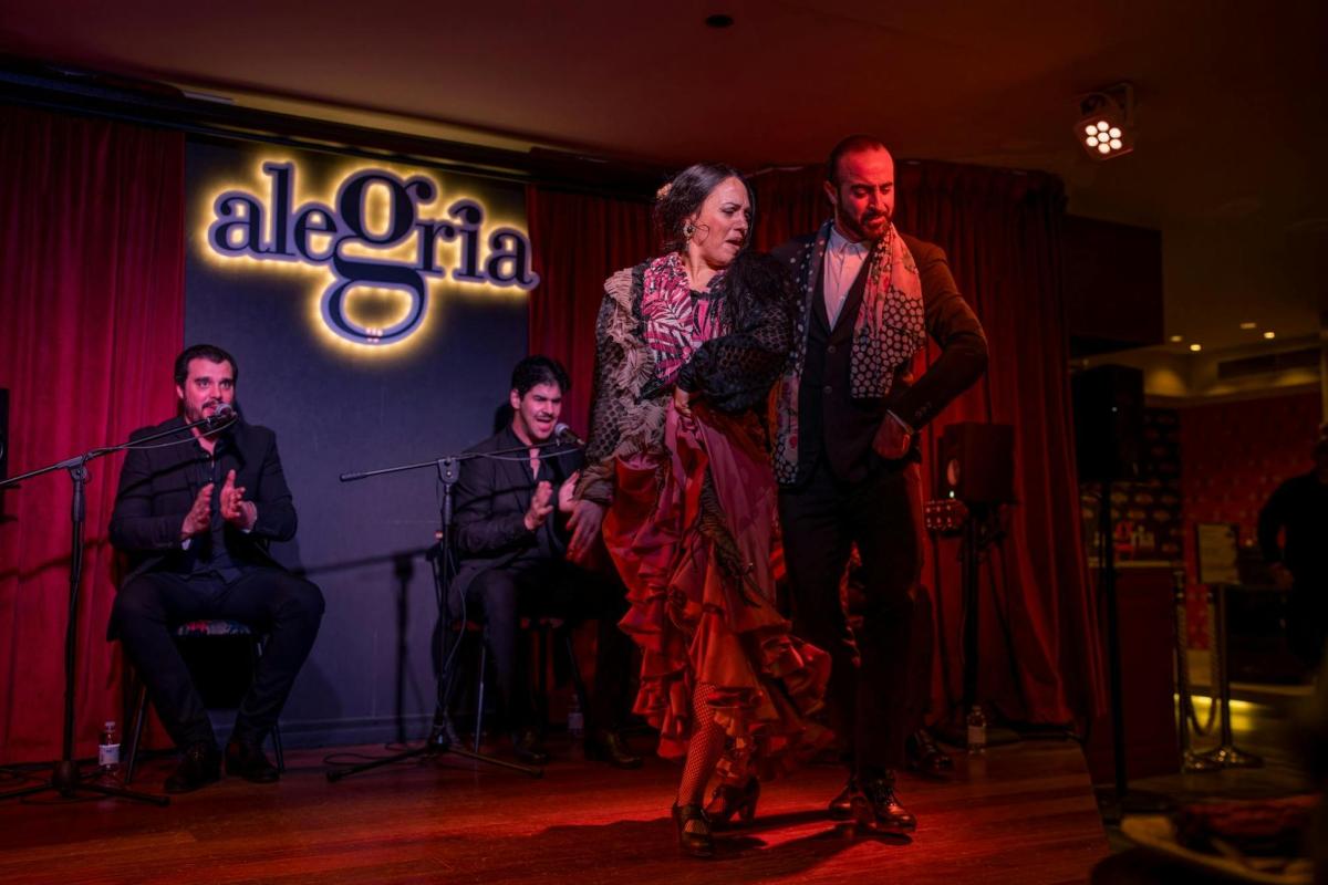 a group of people standing on a stage