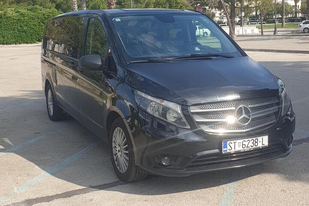 a black van parked in a parking lot