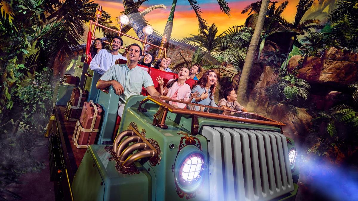 a group of people riding on a roller coaster