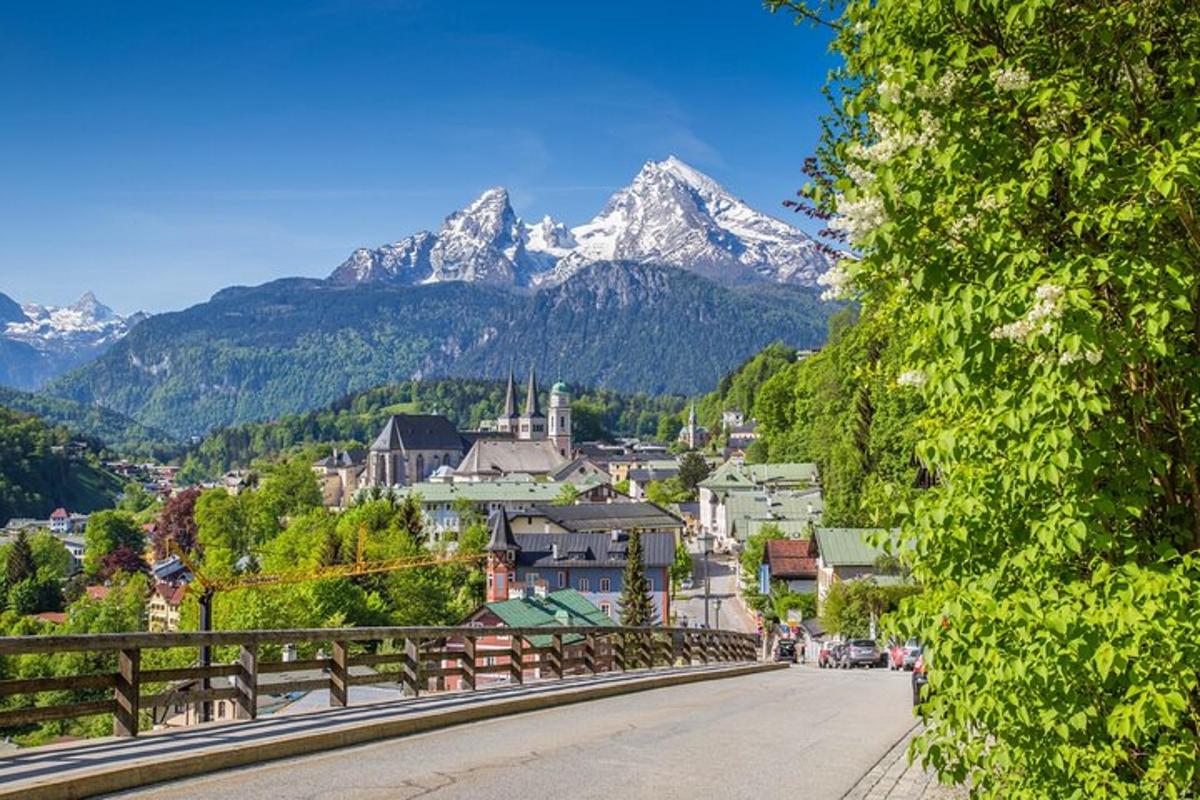 a view of a town with mountains in the background