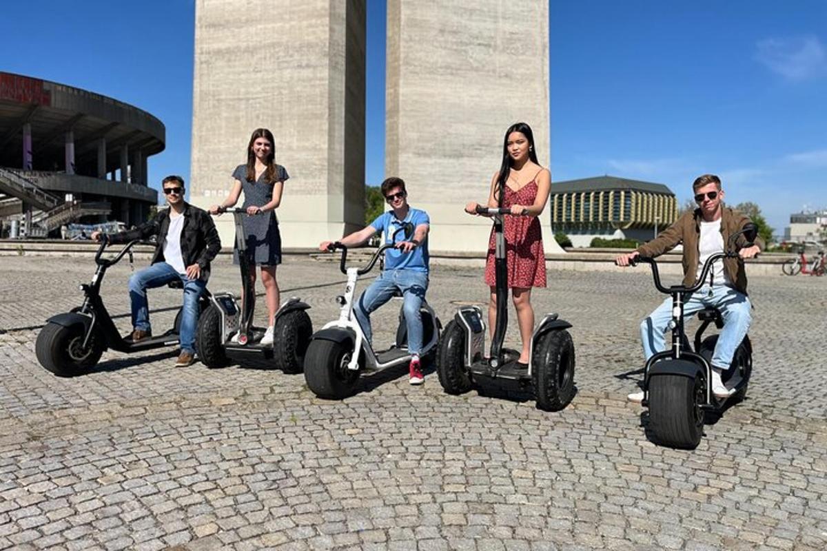a group of people riding on segways in front of a building