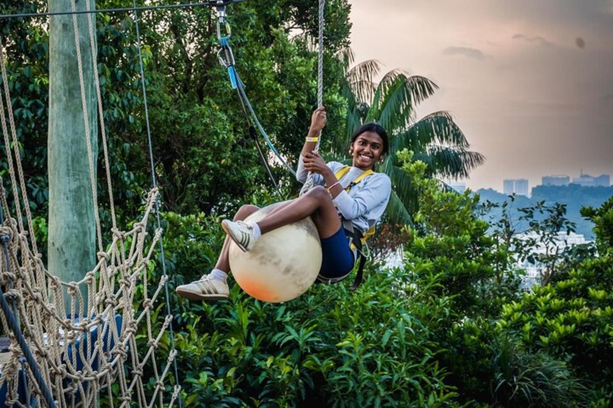 a woman is swinging on a rope swing