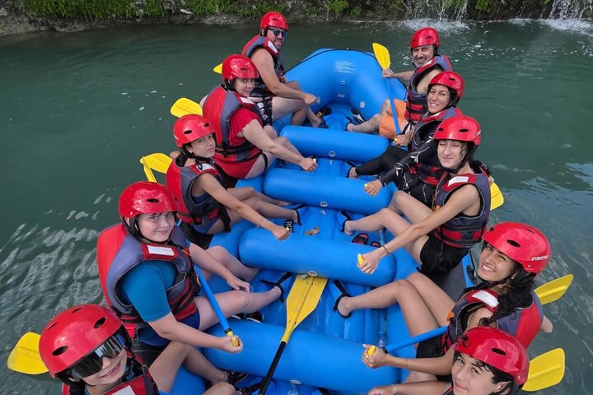 a group of people in a raft on a river