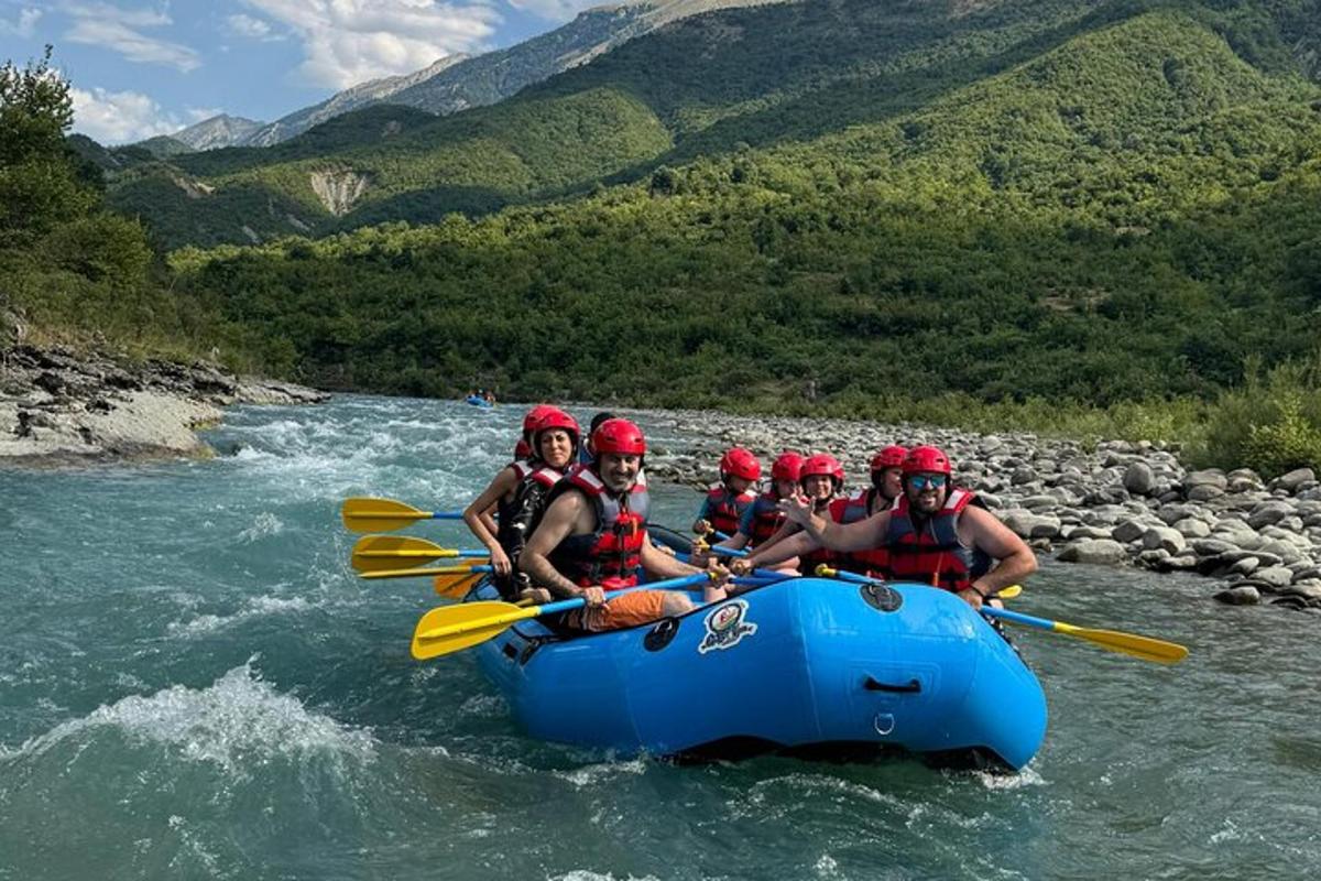 a group of people in a raft on a river