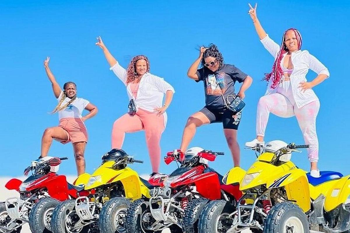 a group of women are standing on their motorcycles
