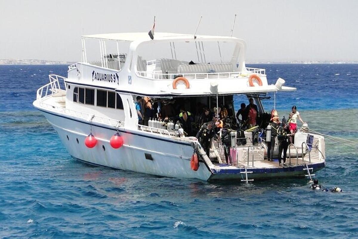 a group of people on a boat in the water