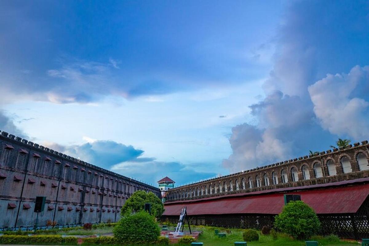a large building with a clock tower in the distance