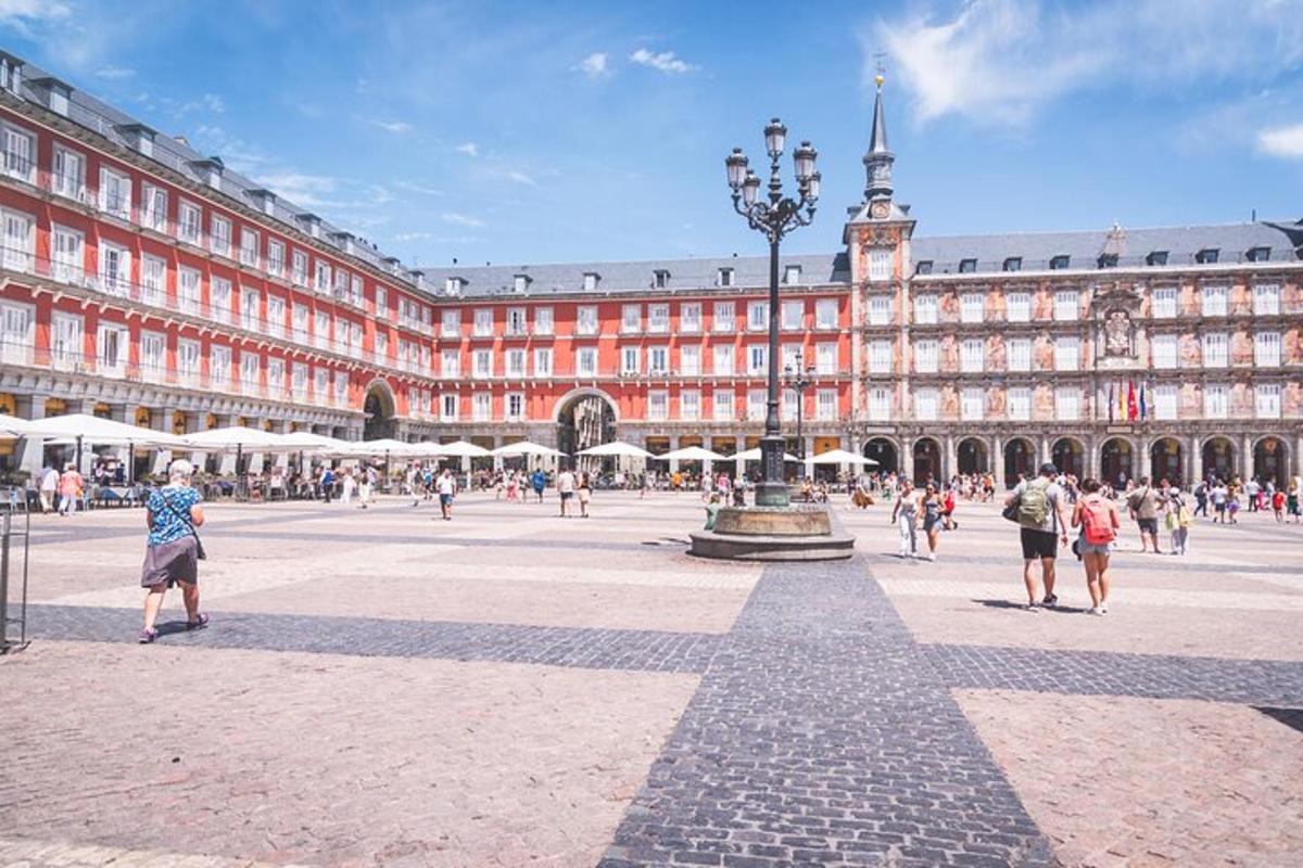 a large building with people walking in front of it