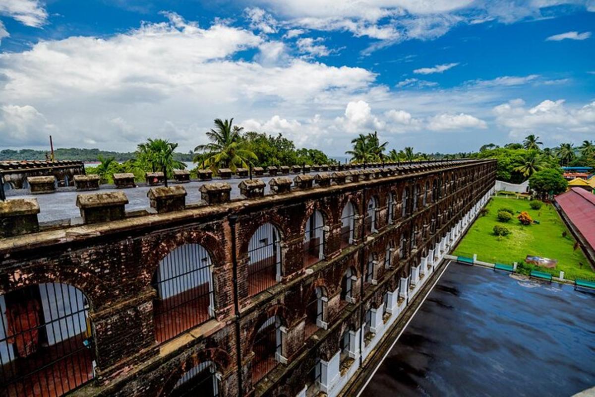 an old brick bridge over a river with water