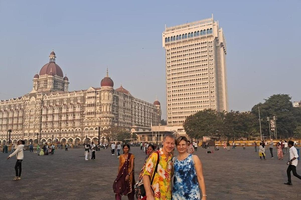 a group of people standing in front of buildings