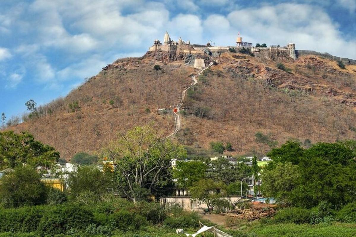 a hill with a castle on top of it