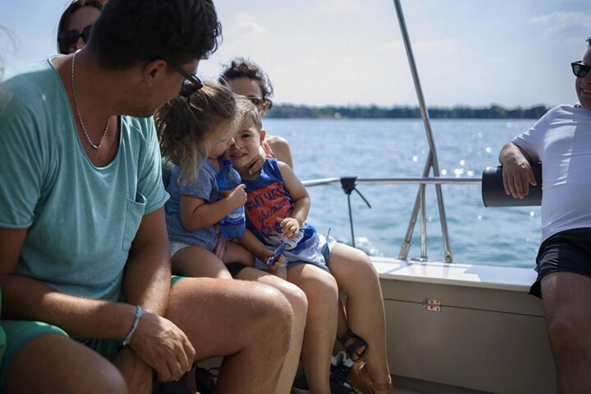a group of people sitting on a boat