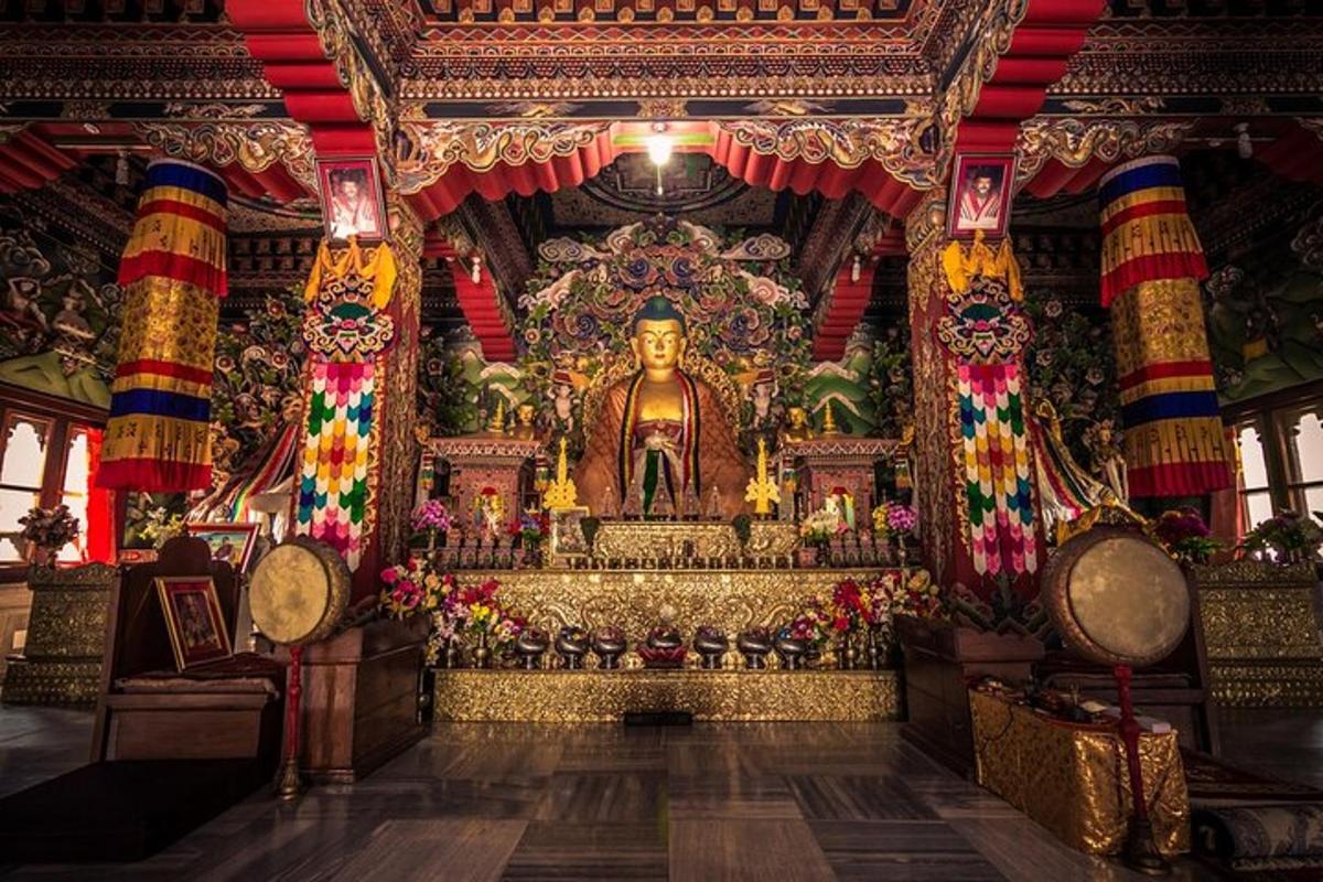 a large temple with a large statue in a room