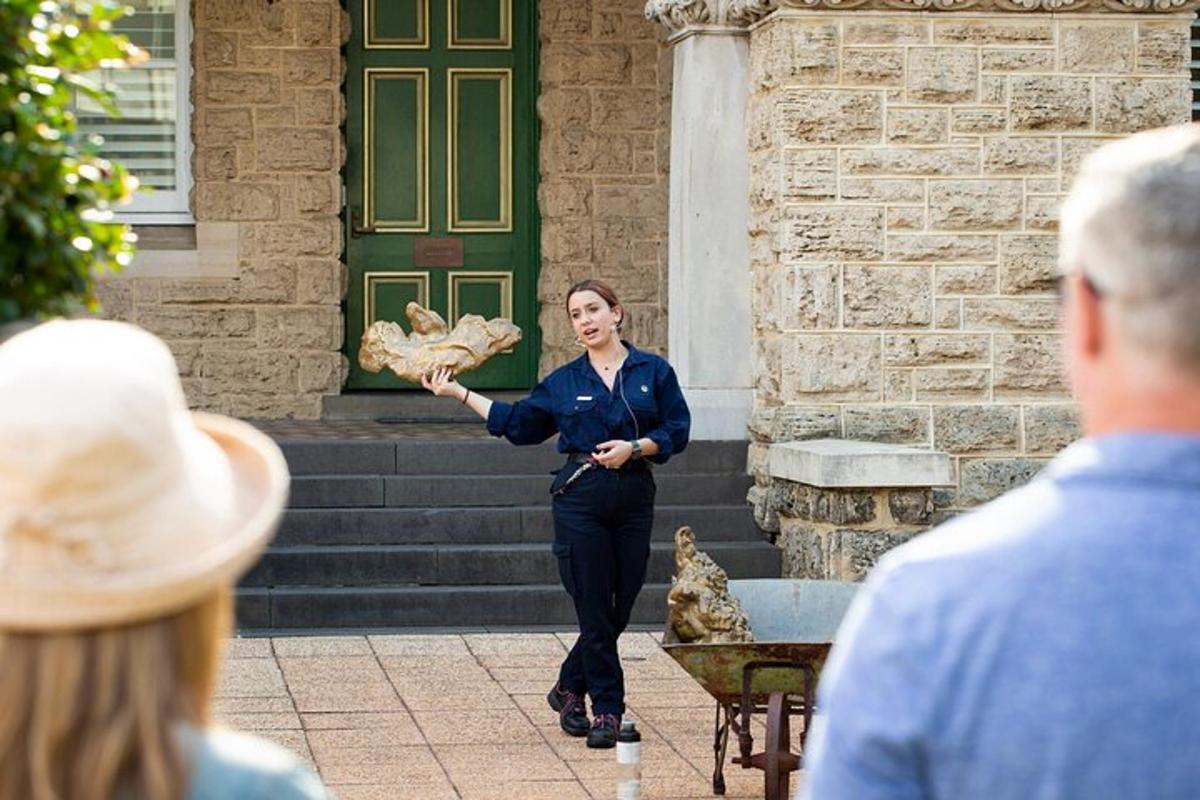 a woman is standing in front of a building