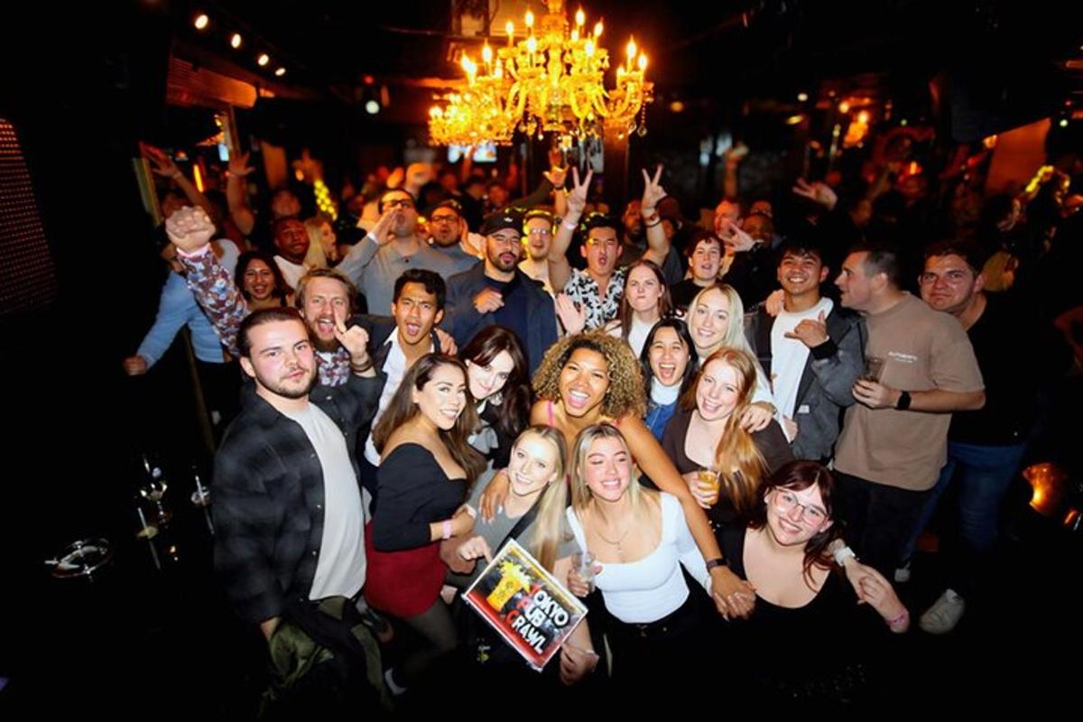 a group of people posing for a picture at a party
