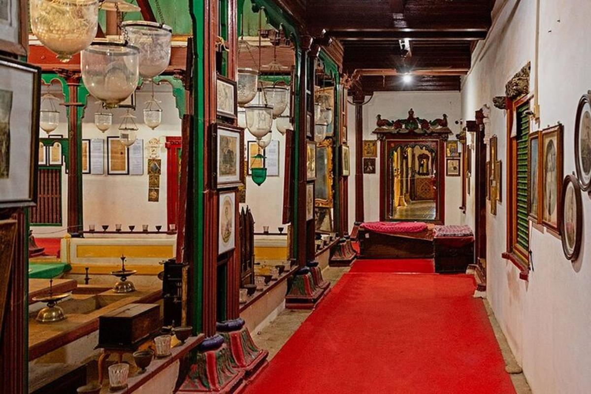 a red carpet in a room with a red rug