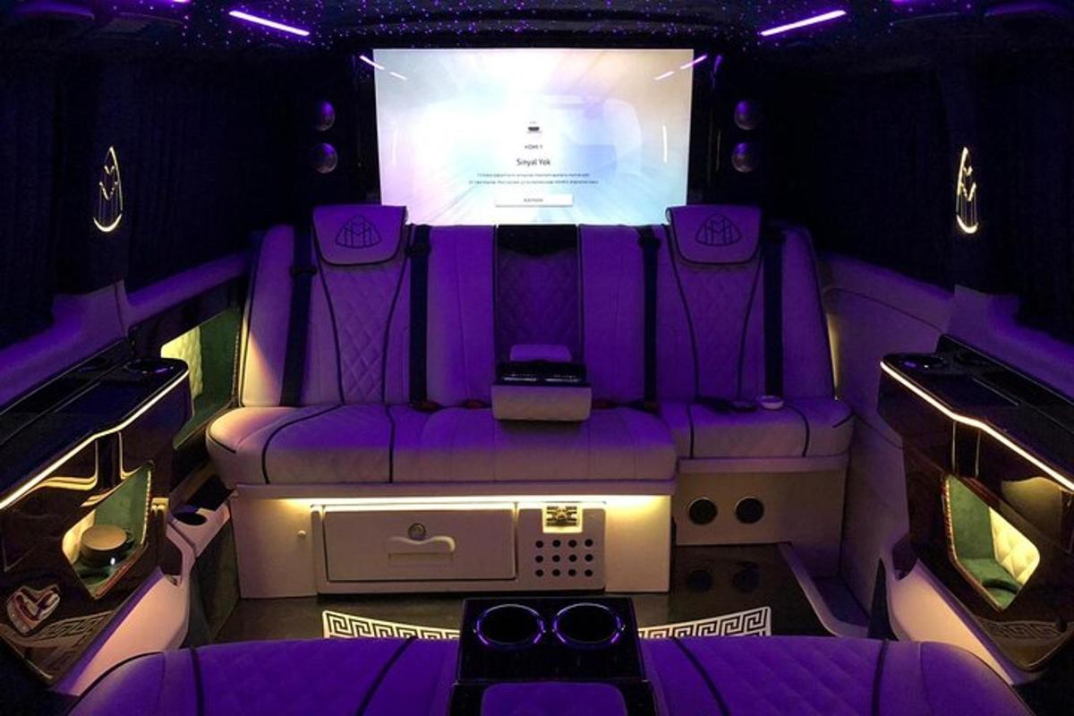 a stage with purple chairs in a limo