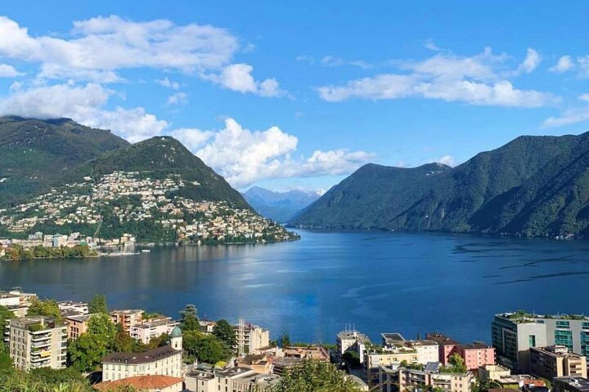 a view of a large body of water with mountains