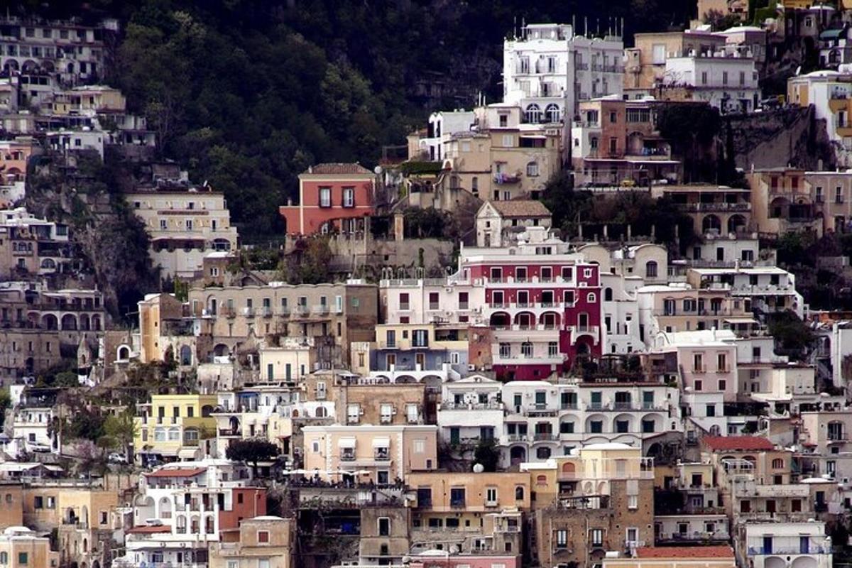 a bunch of buildings on a hill with houses