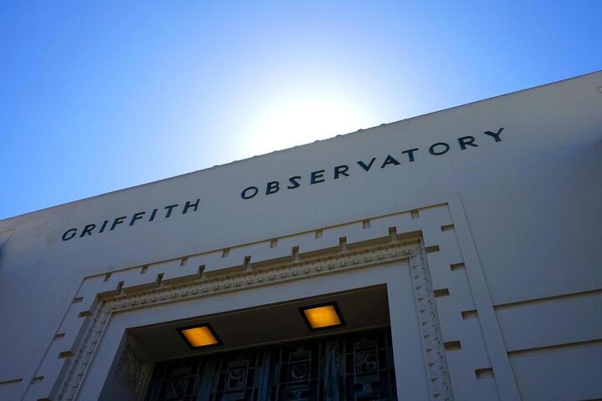 a building with the sign for the department of observatory