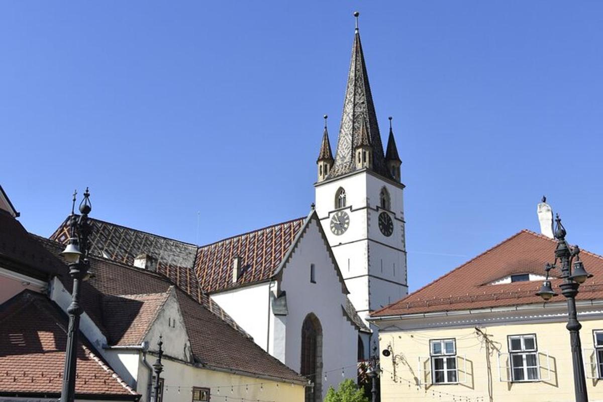 a church with a tower with a clock on it