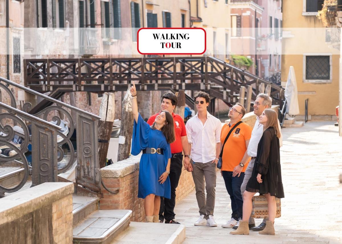 a group of people walking down a street