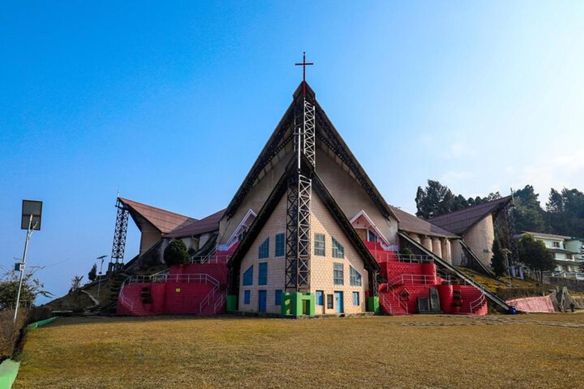a church with a cross on the front of it