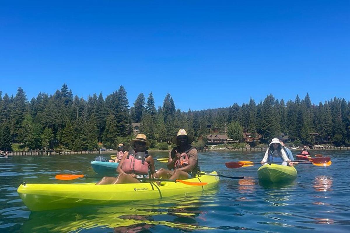 a group of people in kayaks on the water