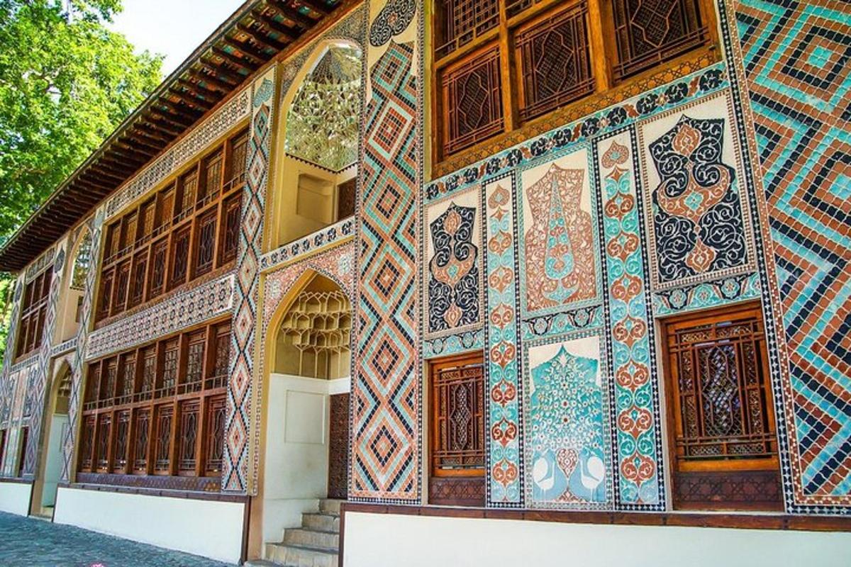 a building with mosaics on the side of it