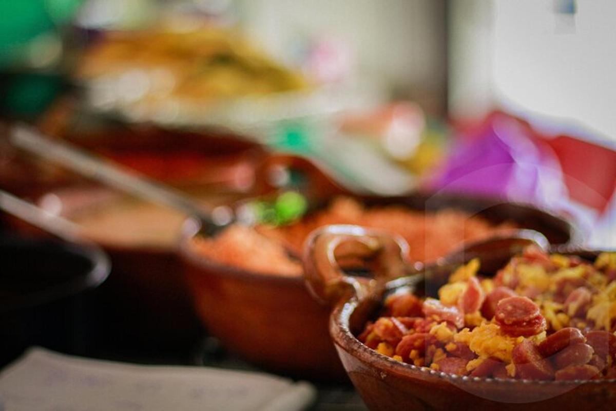 a group of bowls of food on a table