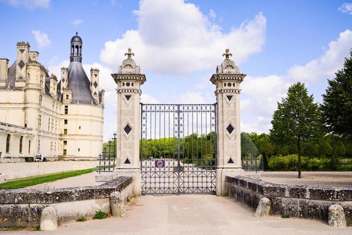 an entrance to a castle with a gate