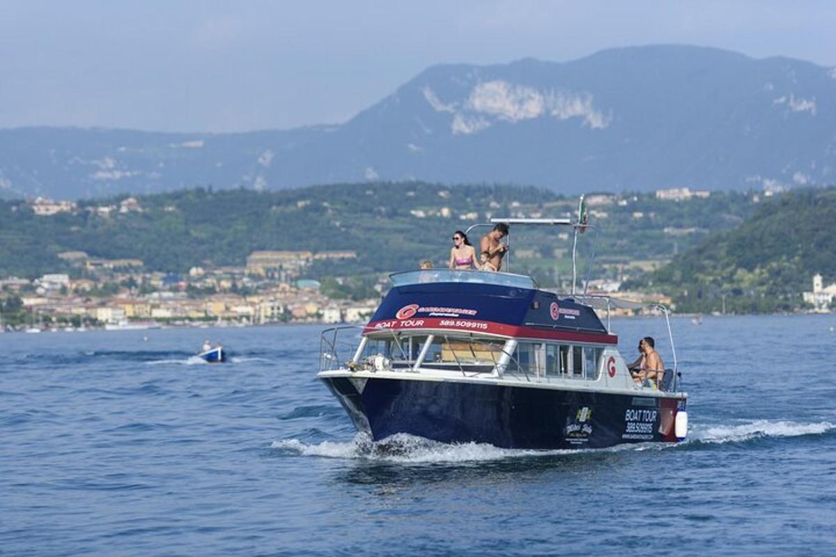 a group of people on a boat in the water